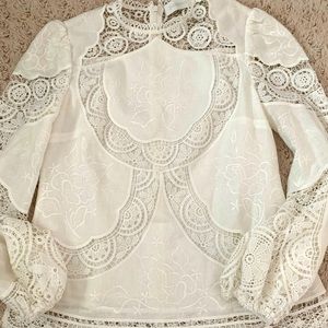 Zimmerman top size 0.  Pristine condition no flaws.